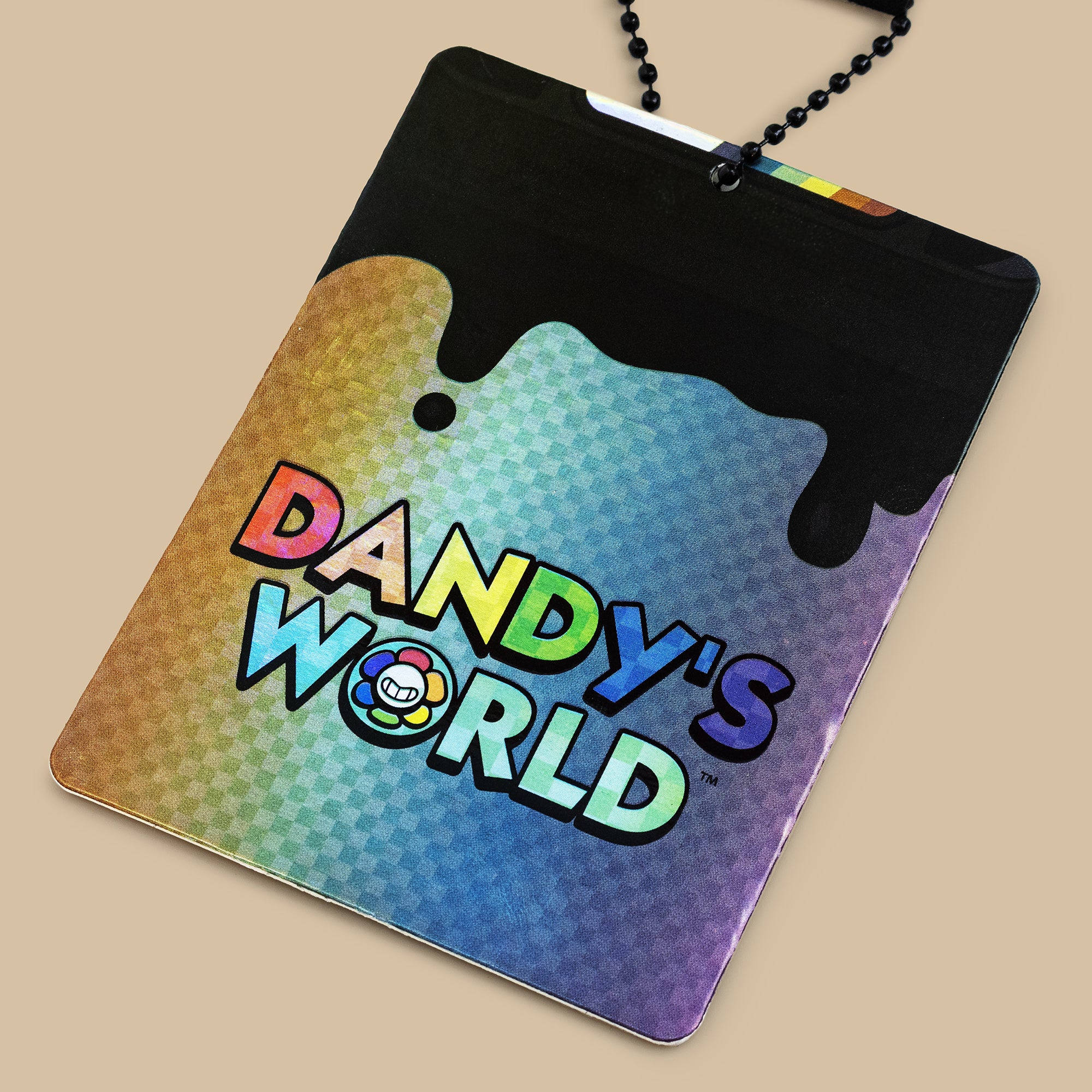 Colorful pendant with 'Dandy's World' text on a beige background