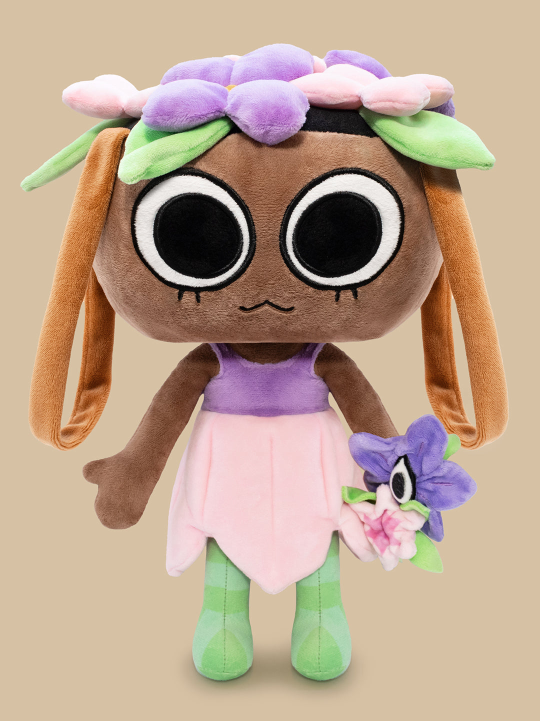 Plush toy with brown face, purple dress, and flower accessories on a beige background