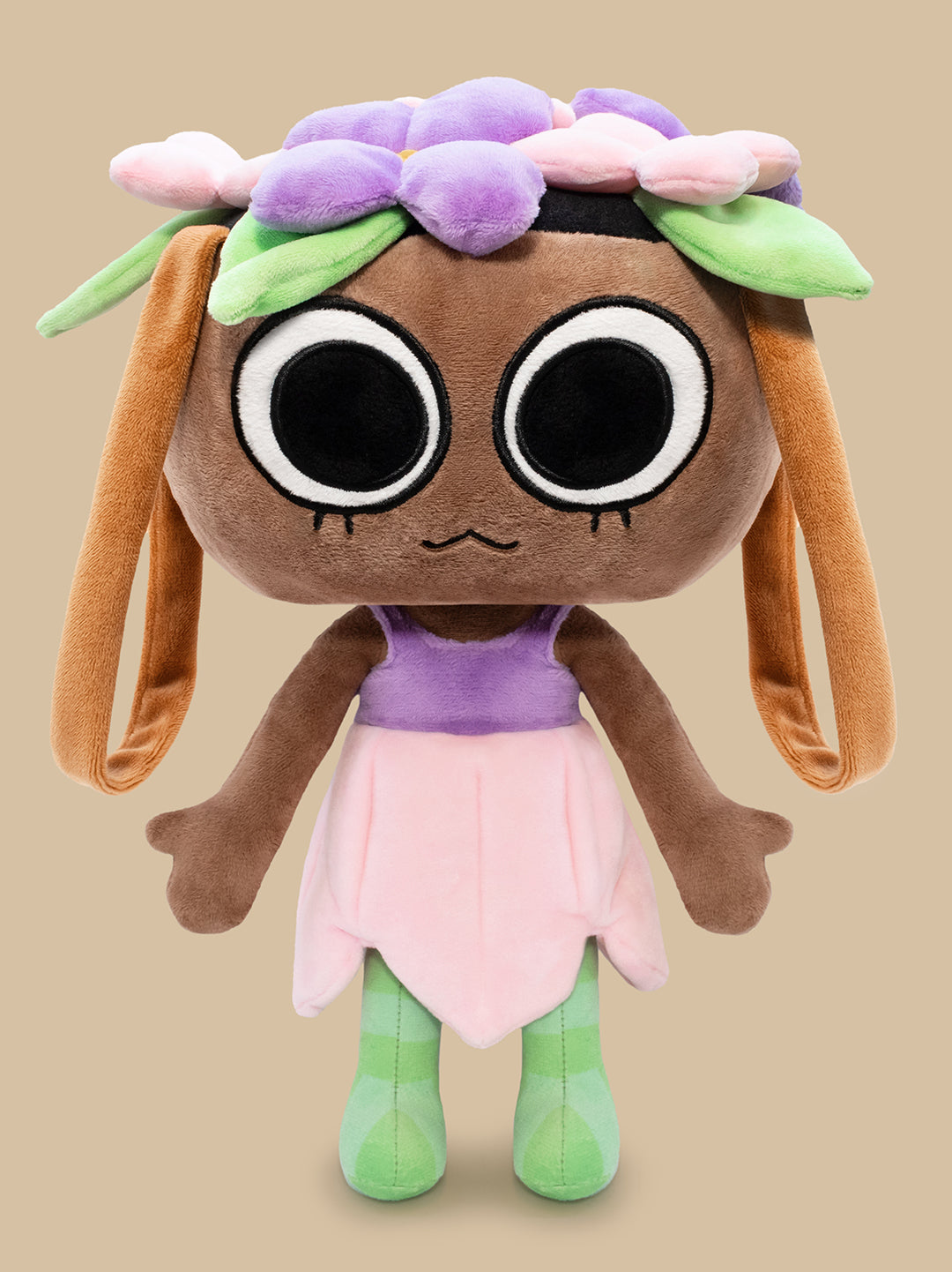 Plush toy with a flower crown on a beige background