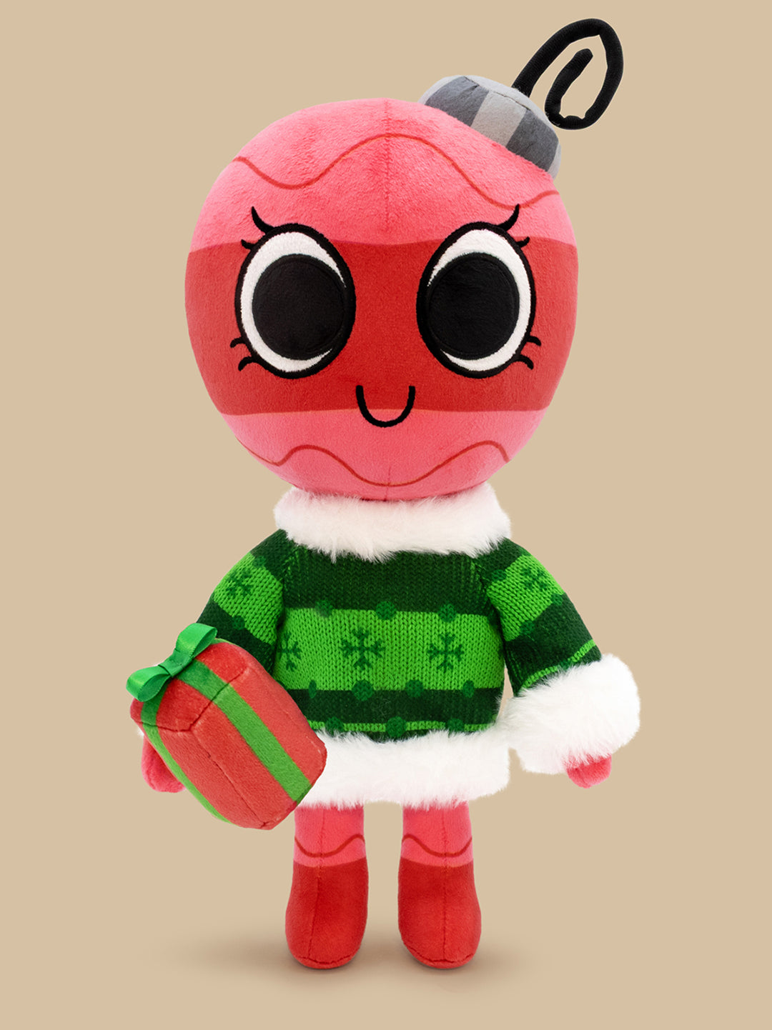 bobette standing facing forward. holding present plush in right hand.