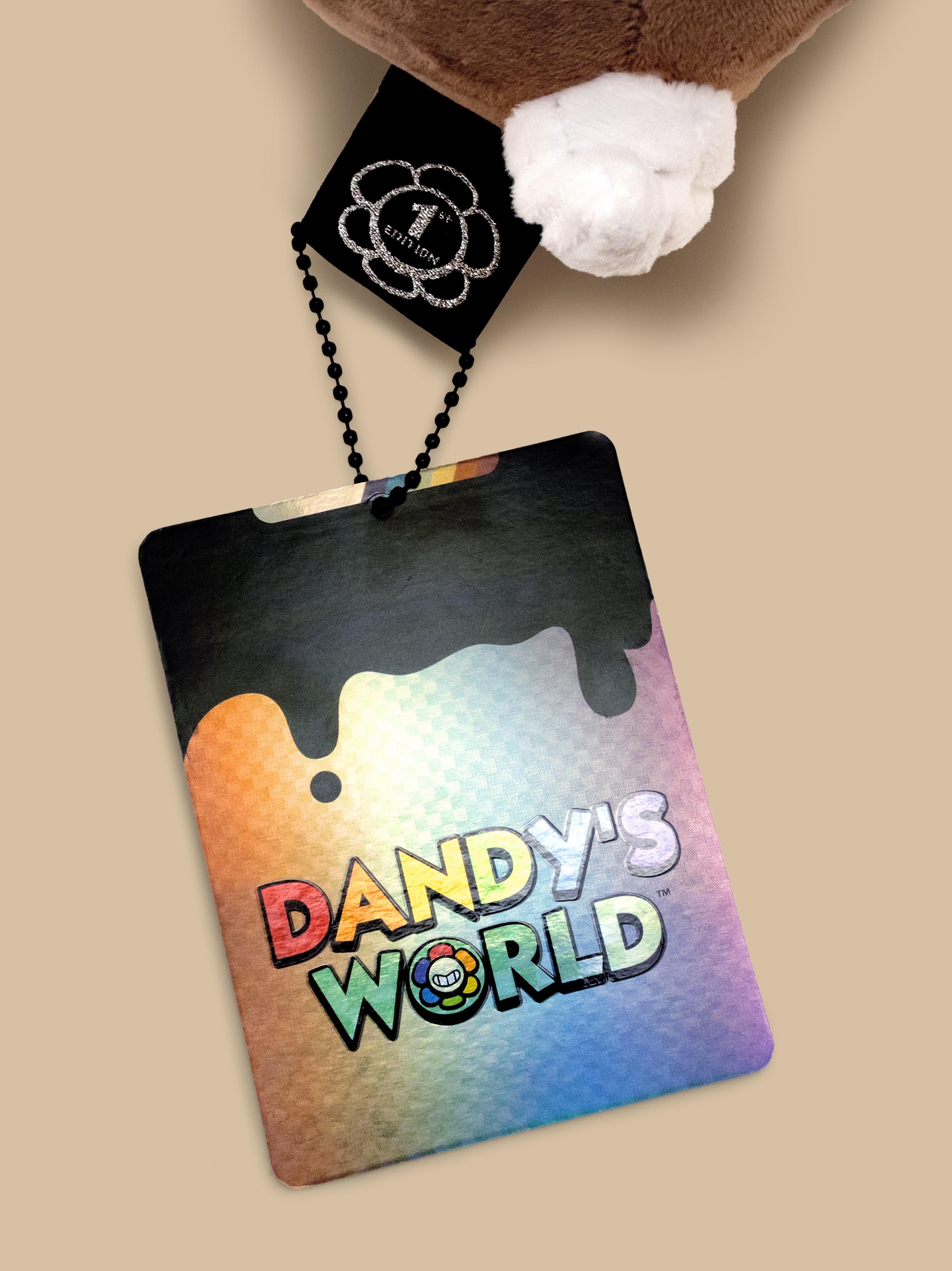 Colorful card with 'Dandy's World' text on a beige background