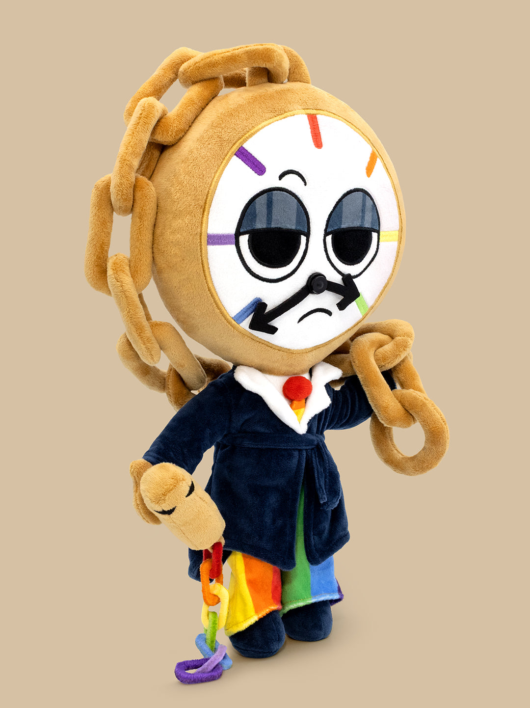 Plush toy with a clock face and colorful outfit on a beige background