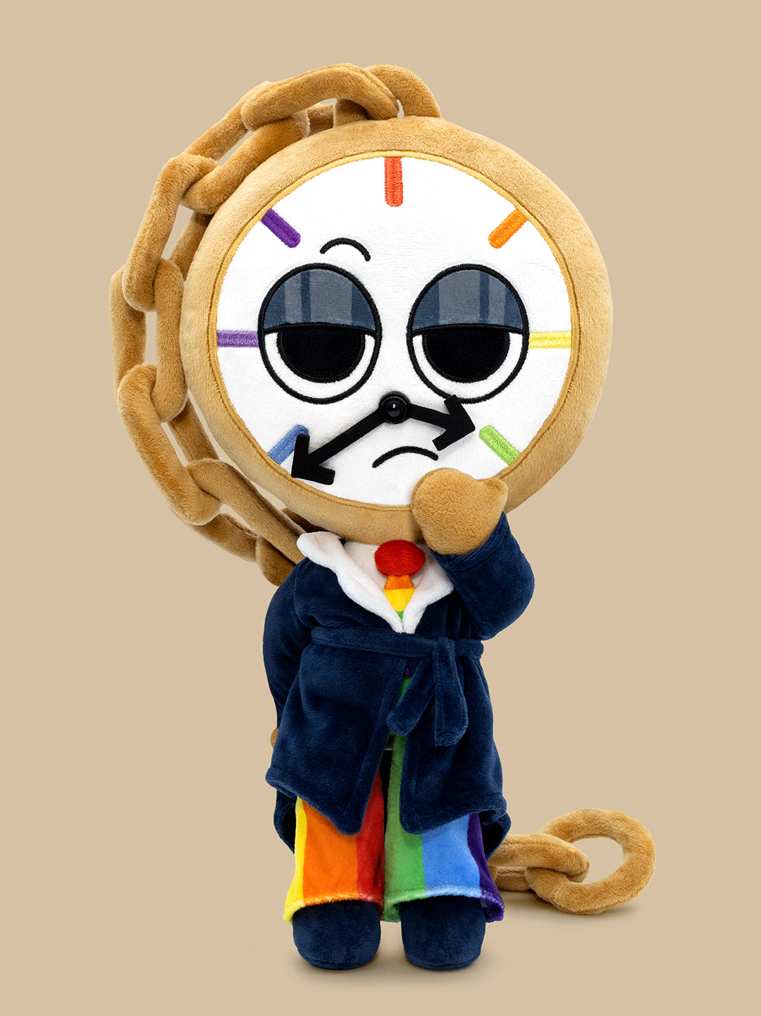 Plush toy with a clock face and colorful outfit on a beige background