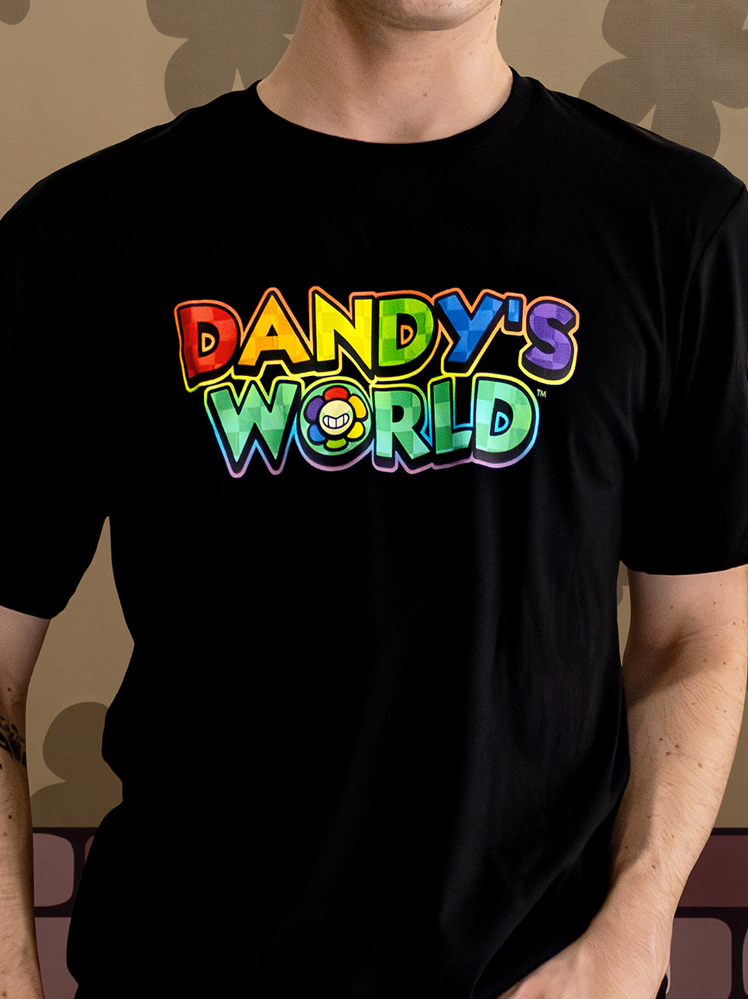 Black t-shirt with 'Dandy's World' colorful text design on a plain background