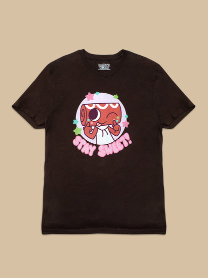 A dark brown short-sleeve t-shirt with a colorful graphic of a cartoon character and the text 'IT'S MY SWEET!' on the front, displayed flat against a solid beige background.