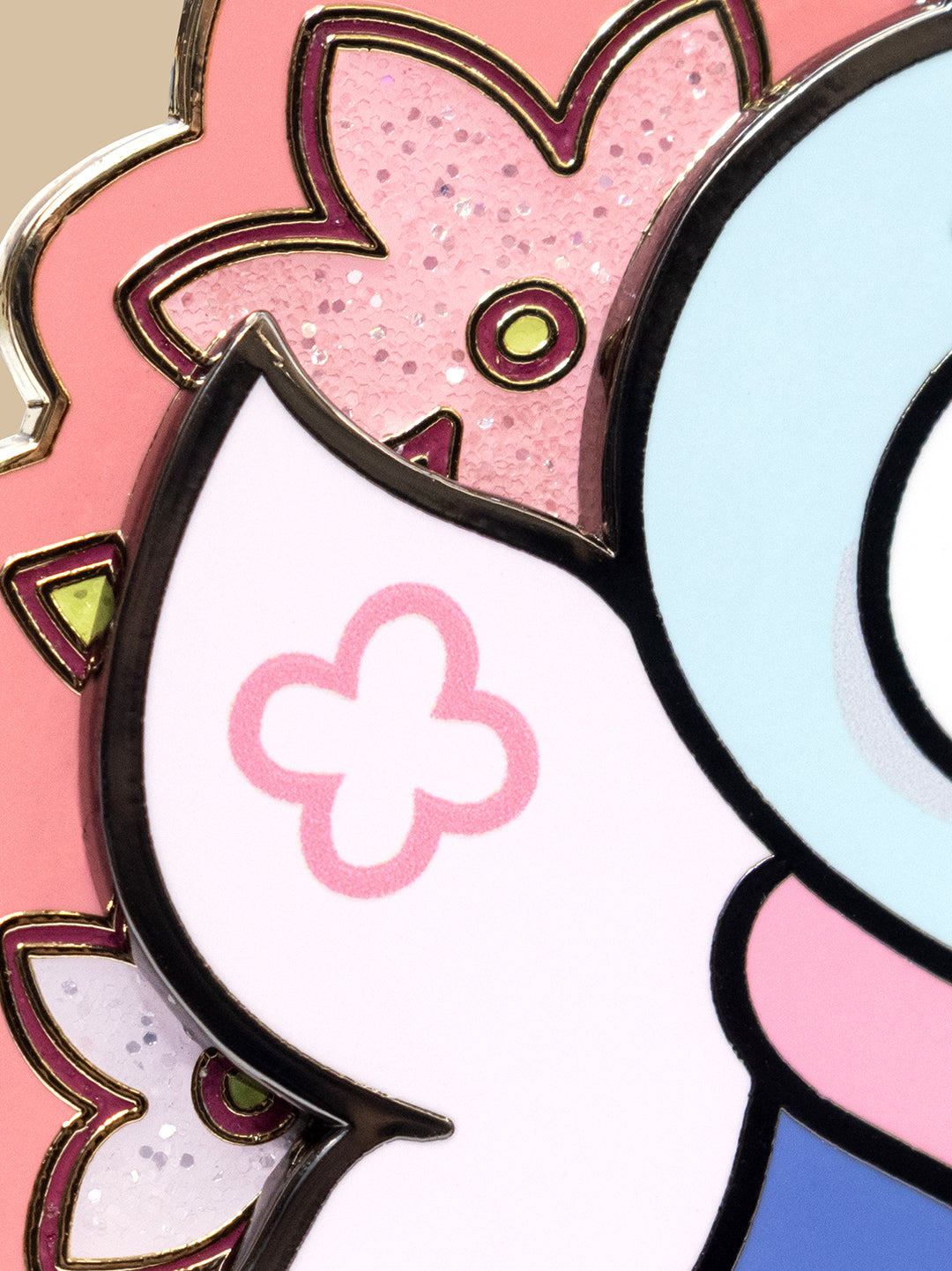 Close-up of a colorful, cartoon-like character with pink, white, and blue colors.