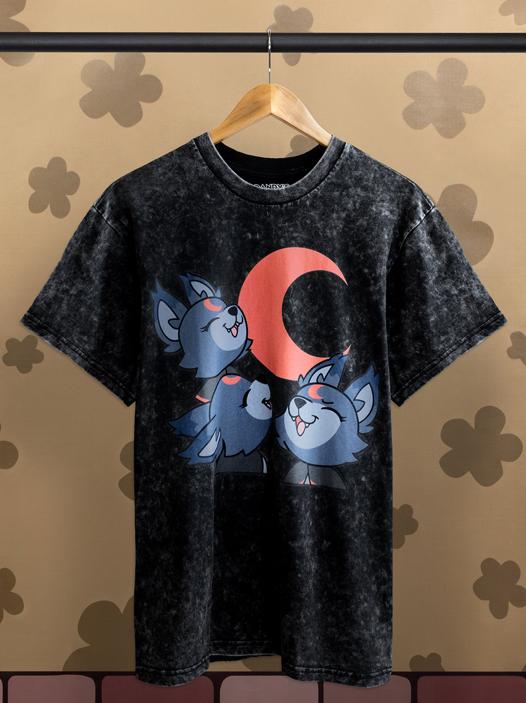 dark washed vintage t-shirt with 3 eclipse wolfs howling at red crescent moon. shirt on hanger with background.