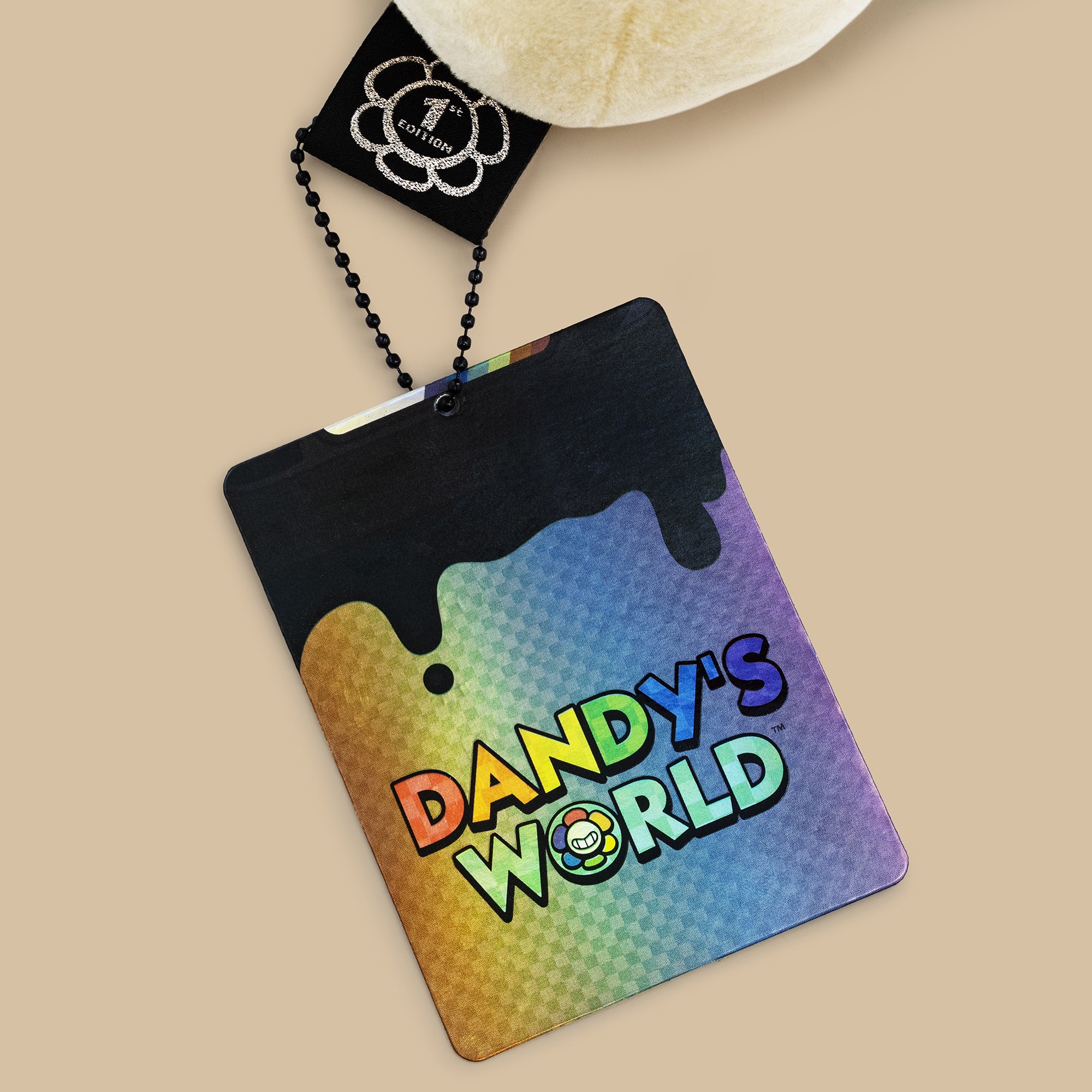 Colorful cardholder with 'Dandy's World' text on a beige background