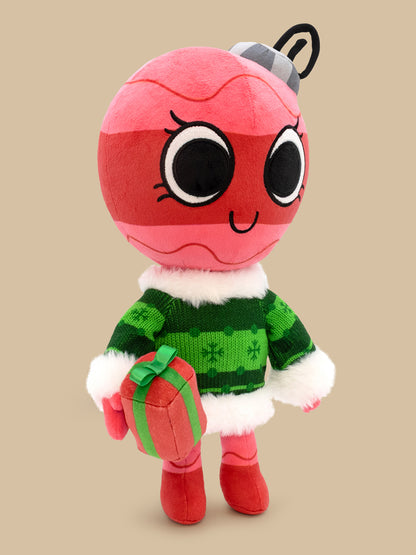 bobette standing facing right holding present in right hand