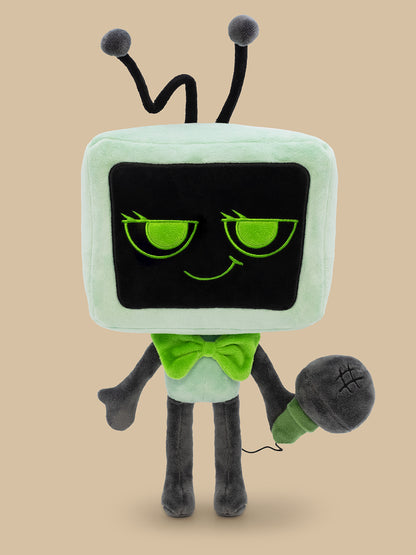 Plush toy resembling a vintage television set with a face, green eyes, and a microphone on a beige background.