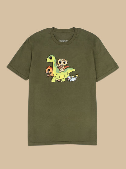 Green t-shirt with cartoon dinosaur design on a beige background